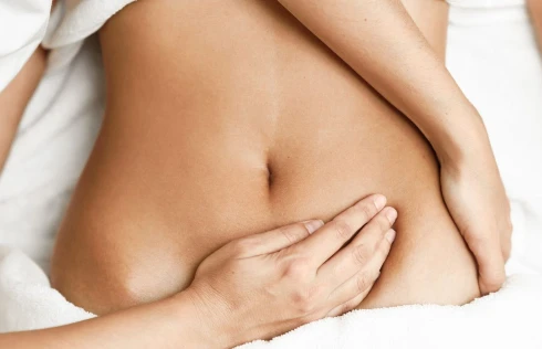 Post-surgical lymphatic drainage massage on the abdomen at Massage by Laura, Runaway Bay Gold Coast